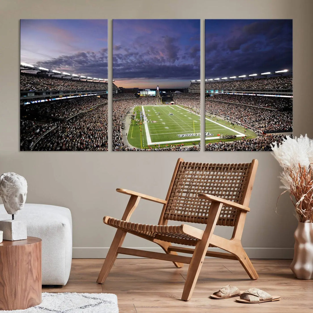 The living room showcases a remarkable set of canvases, the "New England Patriots Football Team Print - Foxborough Gillette Stadium Wall Art Canvas Print." This triptych captures a crowded football stadium at sunset, and each piece is coated with UV-protective layers to ensure lasting vibrancy. Additionally, you can enjoy the benefit of free shipping with your purchase.