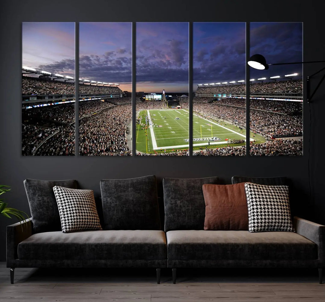 The living room showcases a remarkable set of canvases, the "New England Patriots Football Team Print - Foxborough Gillette Stadium Wall Art Canvas Print." This triptych captures a crowded football stadium at sunset, and each piece is coated with UV-protective layers to ensure lasting vibrancy. Additionally, you can enjoy the benefit of free shipping with your purchase.