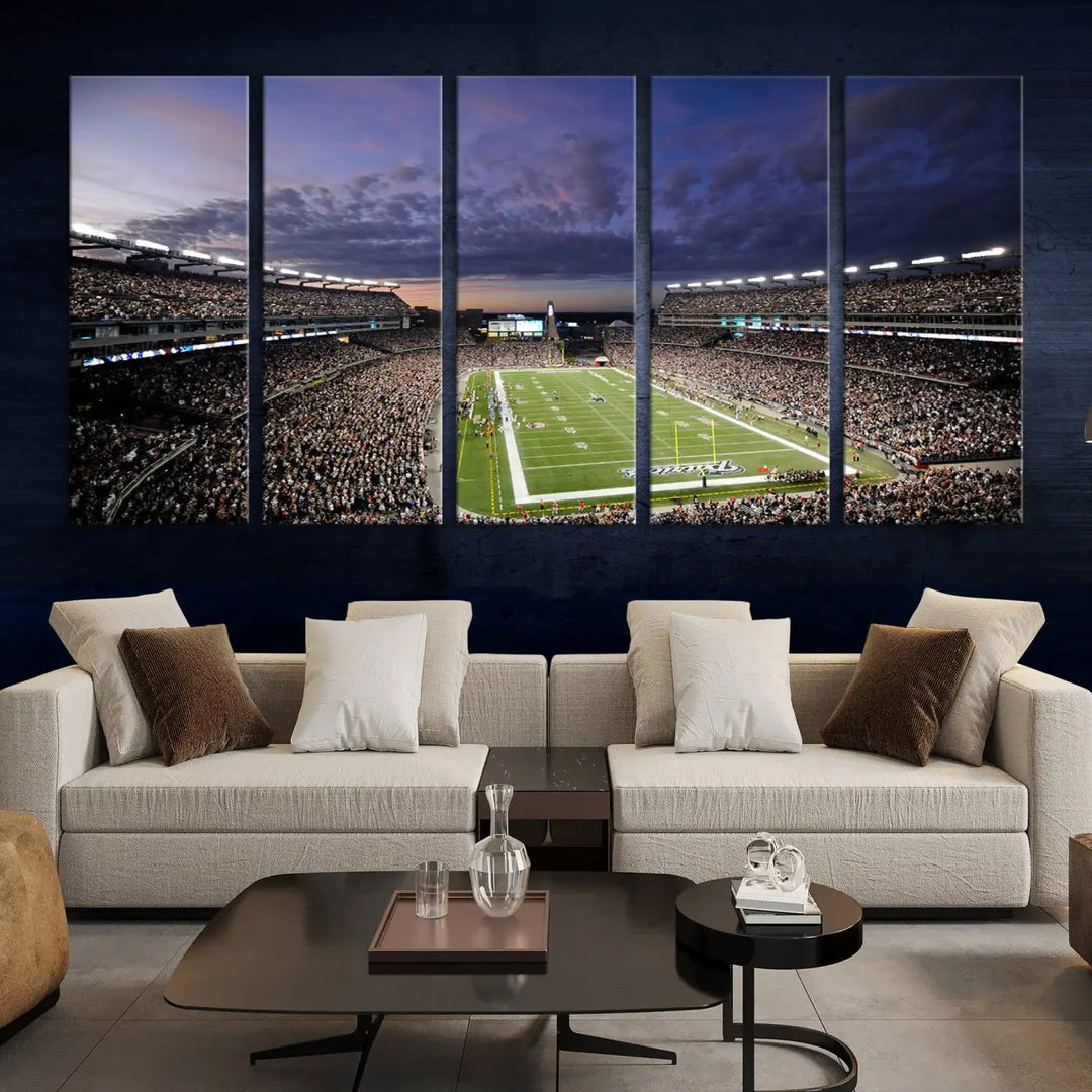 The living room showcases a remarkable set of canvases, the "New England Patriots Football Team Print - Foxborough Gillette Stadium Wall Art Canvas Print." This triptych captures a crowded football stadium at sunset, and each piece is coated with UV-protective layers to ensure lasting vibrancy. Additionally, you can enjoy the benefit of free shipping with your purchase.