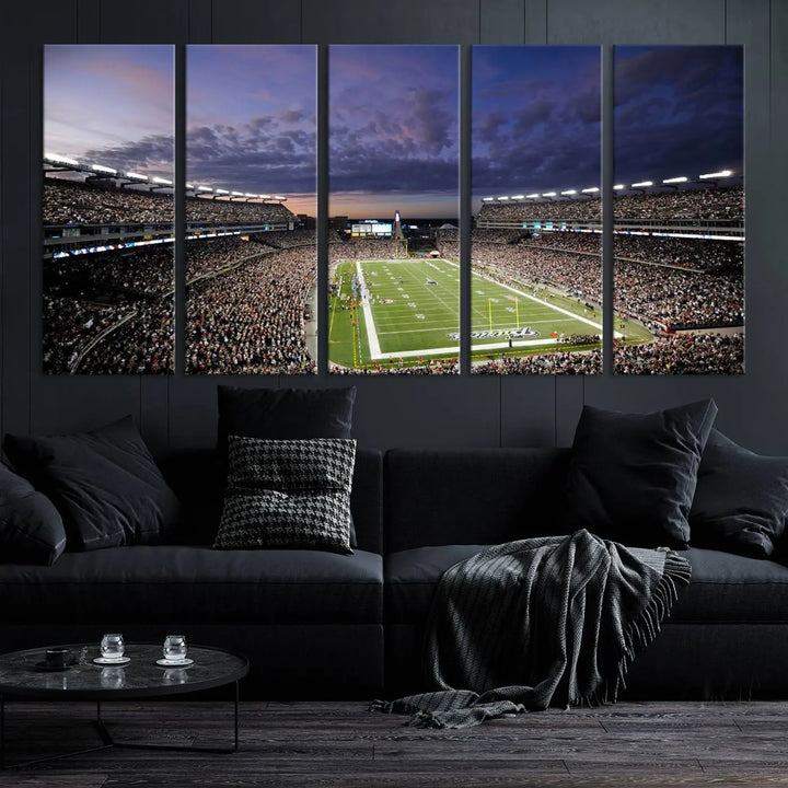 The living room showcases a remarkable set of canvases, the "New England Patriots Football Team Print - Foxborough Gillette Stadium Wall Art Canvas Print." This triptych captures a crowded football stadium at sunset, and each piece is coated with UV-protective layers to ensure lasting vibrancy. Additionally, you can enjoy the benefit of free shipping with your purchase.