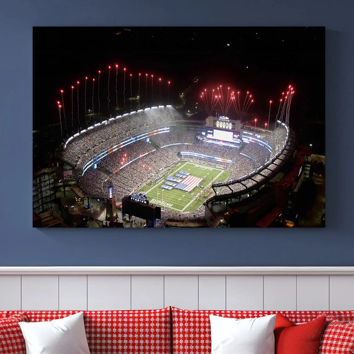 The New England Patriots Football Team Print, showcasing a stunning aerial view of Foxborough Gillette Stadium with fireworks above, is beautifully reproduced on museum-quality canvas and displayed on a wall.