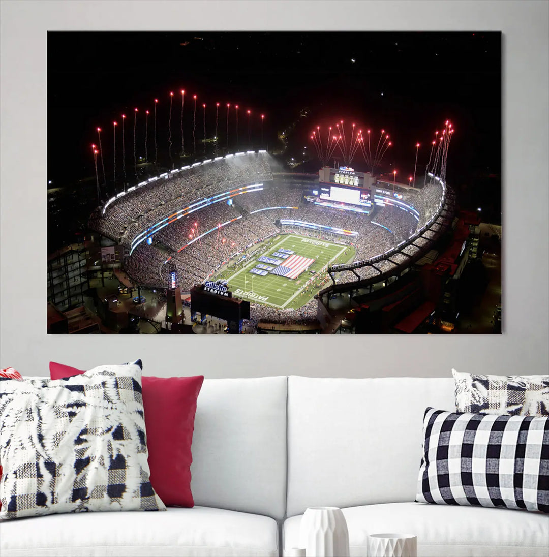 The New England Patriots Football Team Print, showcasing a stunning aerial view of Foxborough Gillette Stadium with fireworks above, is beautifully reproduced on museum-quality canvas and displayed on a wall.