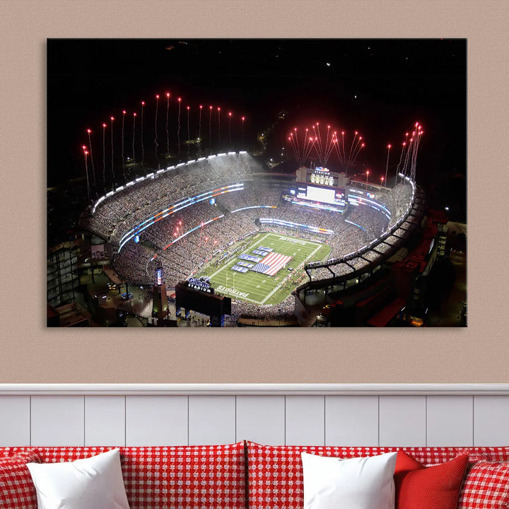 The New England Patriots Football Team Print, showcasing a stunning aerial view of Foxborough Gillette Stadium with fireworks above, is beautifully reproduced on museum-quality canvas and displayed on a wall.