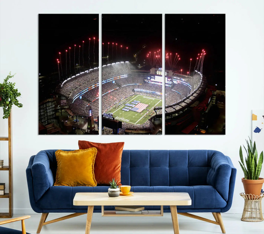 The New England Patriots Football Team Print, showcasing a stunning aerial view of Foxborough Gillette Stadium with fireworks above, is beautifully reproduced on museum-quality canvas and displayed on a wall.