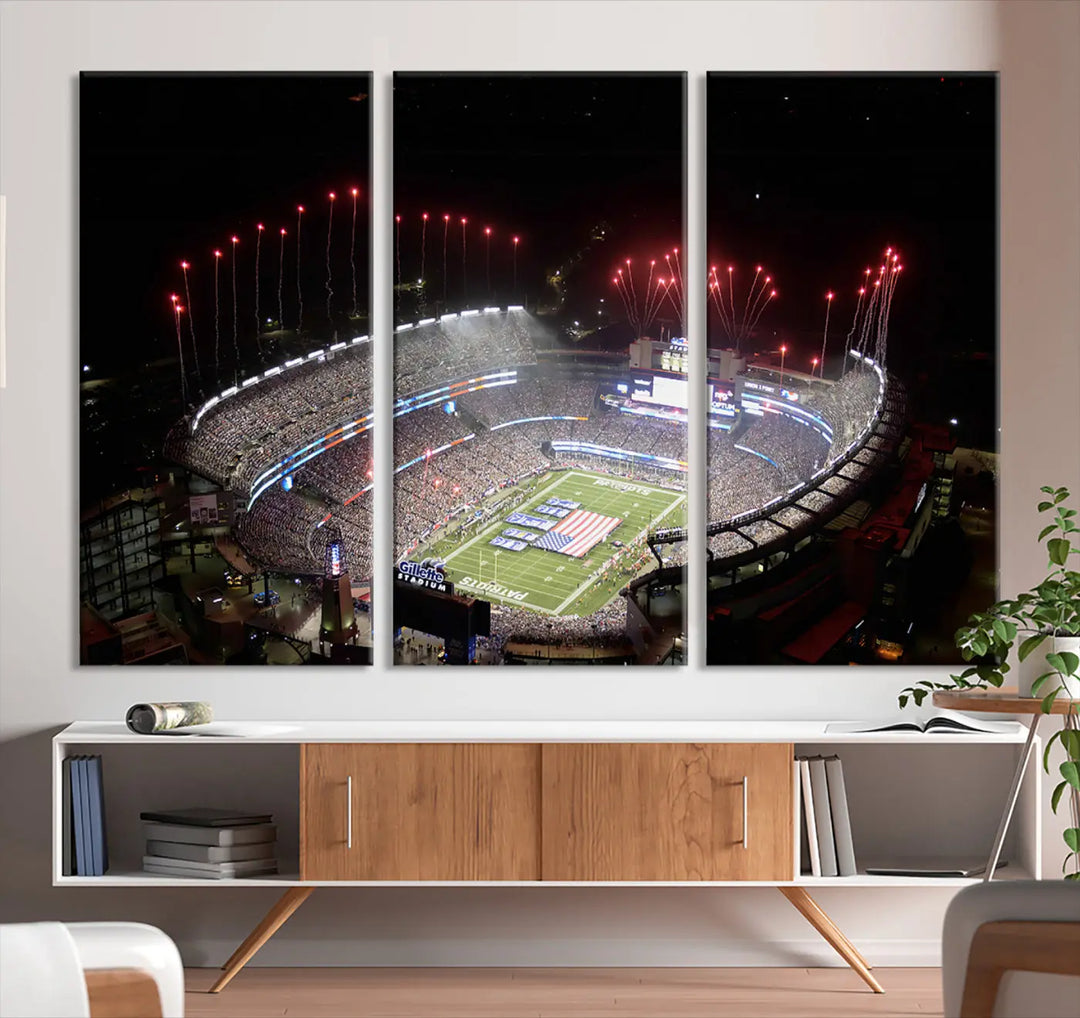 The New England Patriots Football Team Print, showcasing a stunning aerial view of Foxborough Gillette Stadium with fireworks above, is beautifully reproduced on museum-quality canvas and displayed on a wall.