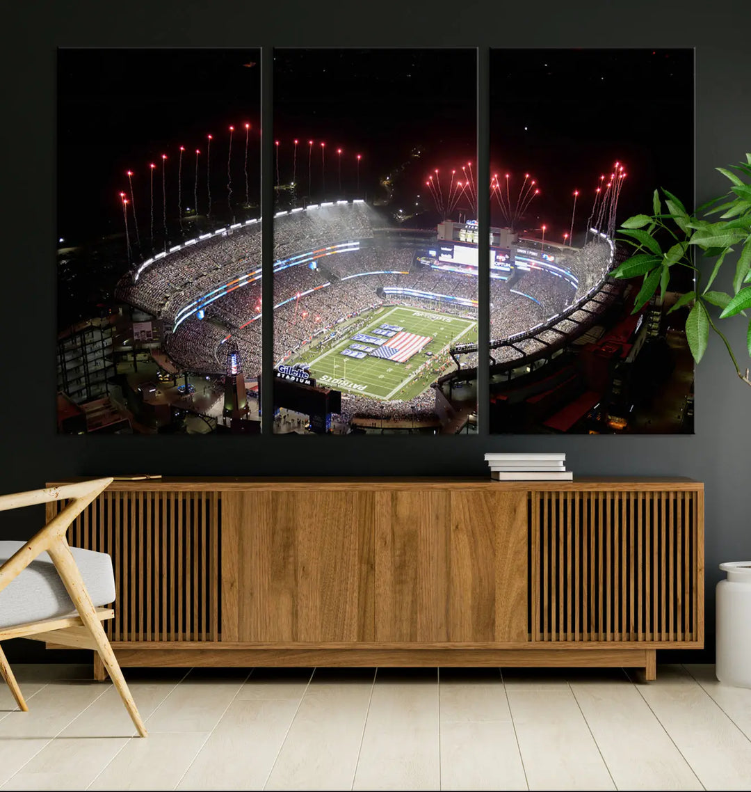 The New England Patriots Football Team Print, showcasing a stunning aerial view of Foxborough Gillette Stadium with fireworks above, is beautifully reproduced on museum-quality canvas and displayed on a wall.