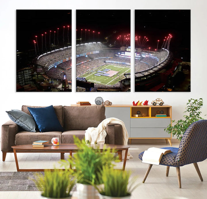 The New England Patriots Football Team Print, showcasing a stunning aerial view of Foxborough Gillette Stadium with fireworks above, is beautifully reproduced on museum-quality canvas and displayed on a wall.