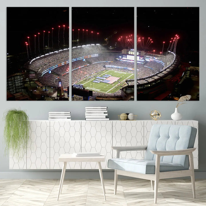 The New England Patriots Football Team Print, showcasing a stunning aerial view of Foxborough Gillette Stadium with fireworks above, is beautifully reproduced on museum-quality canvas and displayed on a wall.