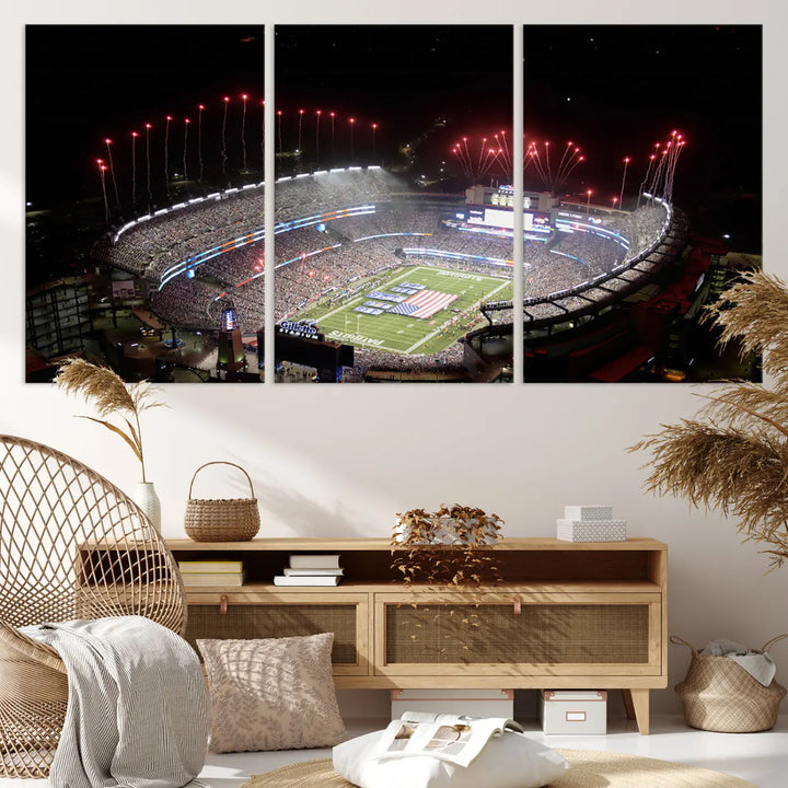 The New England Patriots Football Team Print, showcasing a stunning aerial view of Foxborough Gillette Stadium with fireworks above, is beautifully reproduced on museum-quality canvas and displayed on a wall.