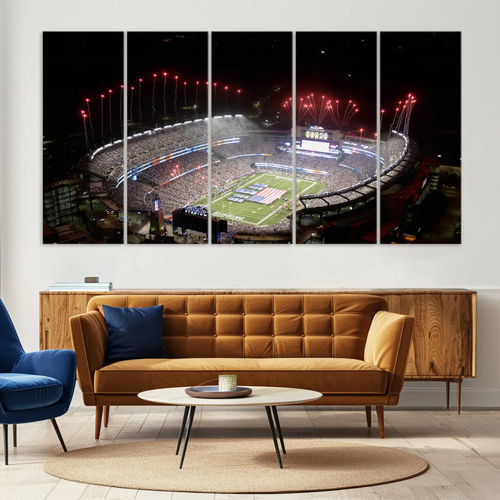 The New England Patriots Football Team Print, showcasing a stunning aerial view of Foxborough Gillette Stadium with fireworks above, is beautifully reproduced on museum-quality canvas and displayed on a wall.