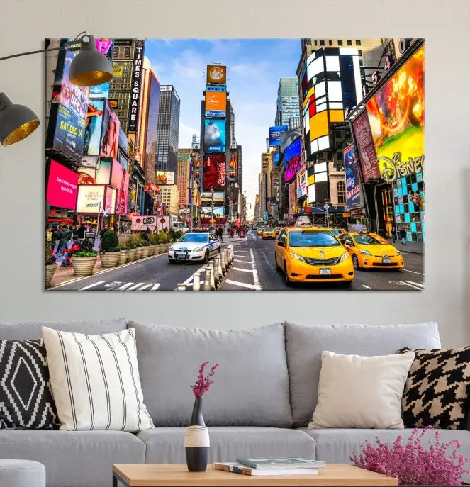 The New York Times Square Cityscape Wall Art is a striking 3-panel large urban canvas print featuring vibrant lights, billboards, taxis, and a bustling street scene of NYC street photography.