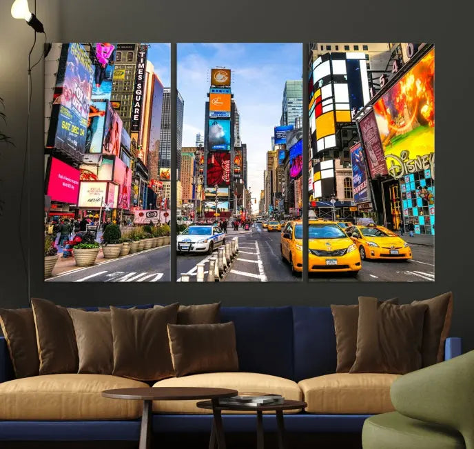 The New York Times Square Cityscape Wall Art is a striking 3-panel large urban canvas print featuring vibrant lights, billboards, taxis, and a bustling street scene of NYC street photography.