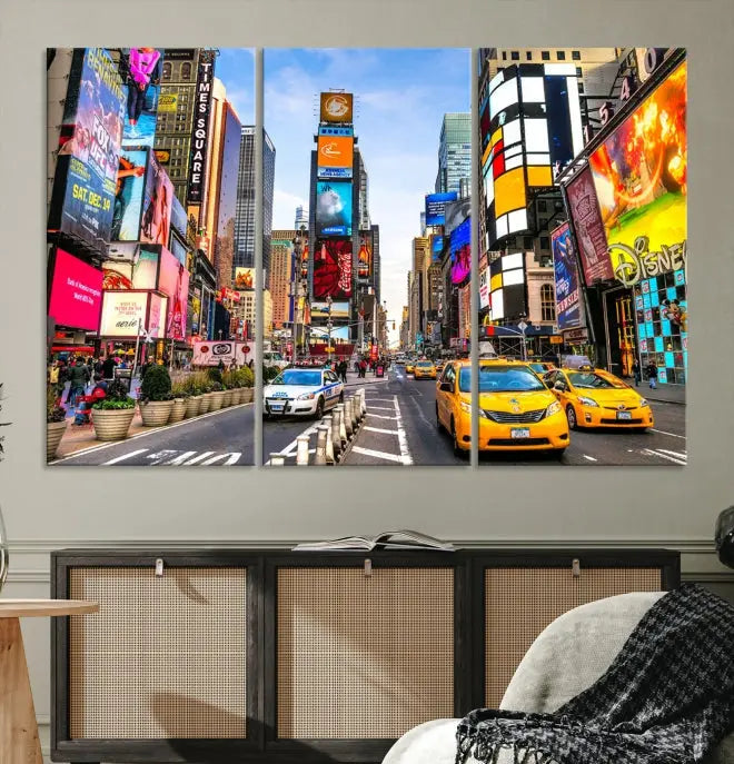 The New York Times Square Cityscape Wall Art is a striking 3-panel large urban canvas print featuring vibrant lights, billboards, taxis, and a bustling street scene of NYC street photography.