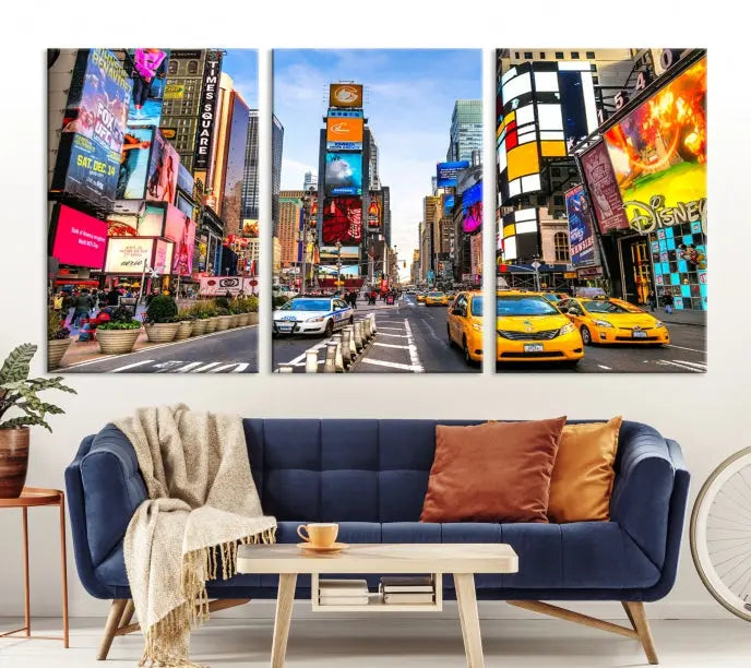 The New York Times Square Cityscape Wall Art is a striking 3-panel large urban canvas print featuring vibrant lights, billboards, taxis, and a bustling street scene of NYC street photography.