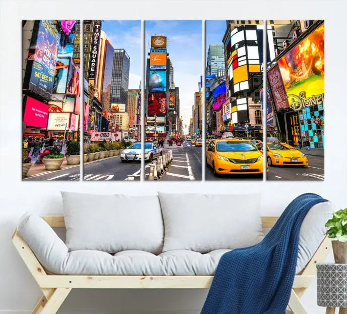 The New York Times Square Cityscape Wall Art is a striking 3-panel large urban canvas print featuring vibrant lights, billboards, taxis, and a bustling street scene of NYC street photography.