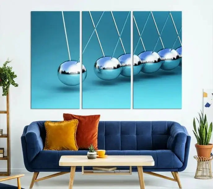 A museum-quality Newton Wall Art Canvas Print adorns the blue wall. This ready-to-hang triptych adds an artistic flair to the room.