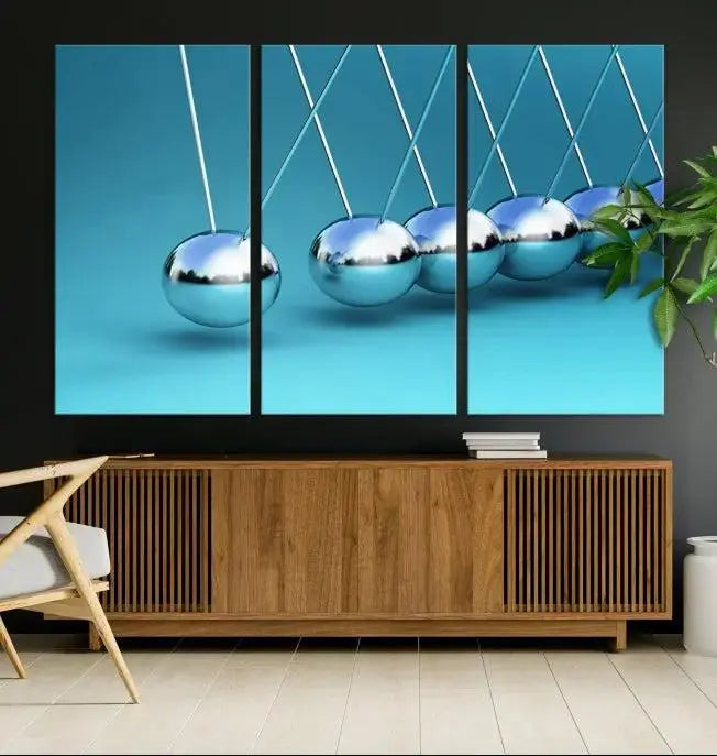 A museum-quality Newton Wall Art Canvas Print adorns the blue wall. This ready-to-hang triptych adds an artistic flair to the room.