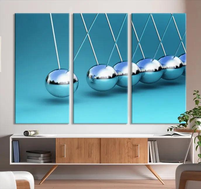 A museum-quality Newton Wall Art Canvas Print adorns the blue wall. This ready-to-hang triptych adds an artistic flair to the room.