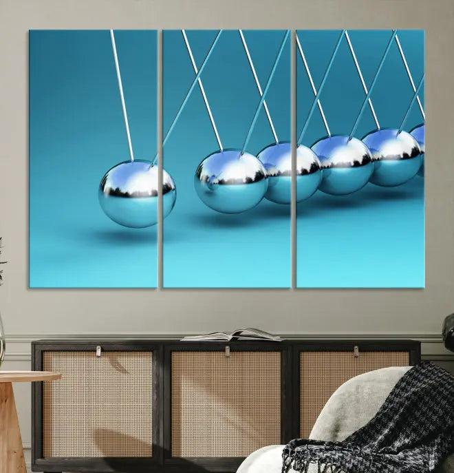 A museum-quality Newton Wall Art Canvas Print adorns the blue wall. This ready-to-hang triptych adds an artistic flair to the room.