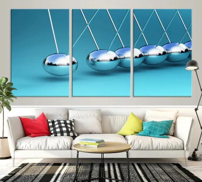 A museum-quality Newton Wall Art Canvas Print adorns the blue wall. This ready-to-hang triptych adds an artistic flair to the room.