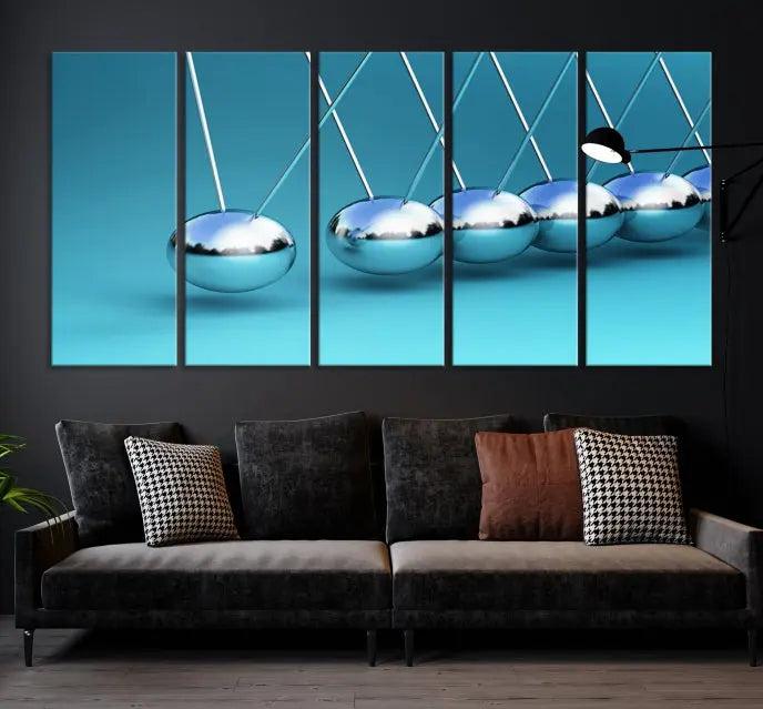 A museum-quality Newton Wall Art Canvas Print adorns the blue wall. This ready-to-hang triptych adds an artistic flair to the room.