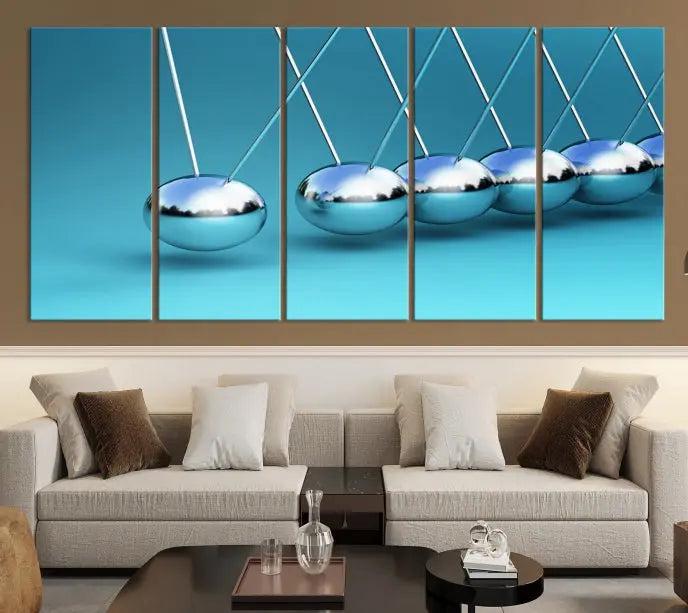 A museum-quality Newton Wall Art Canvas Print adorns the blue wall. This ready-to-hang triptych adds an artistic flair to the room.