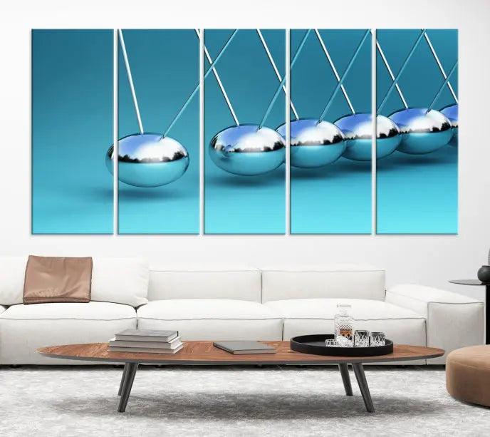 A museum-quality Newton Wall Art Canvas Print adorns the blue wall. This ready-to-hang triptych adds an artistic flair to the room.