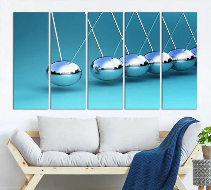 A museum-quality Newton Wall Art Canvas Print adorns the blue wall. This ready-to-hang triptych adds an artistic flair to the room.