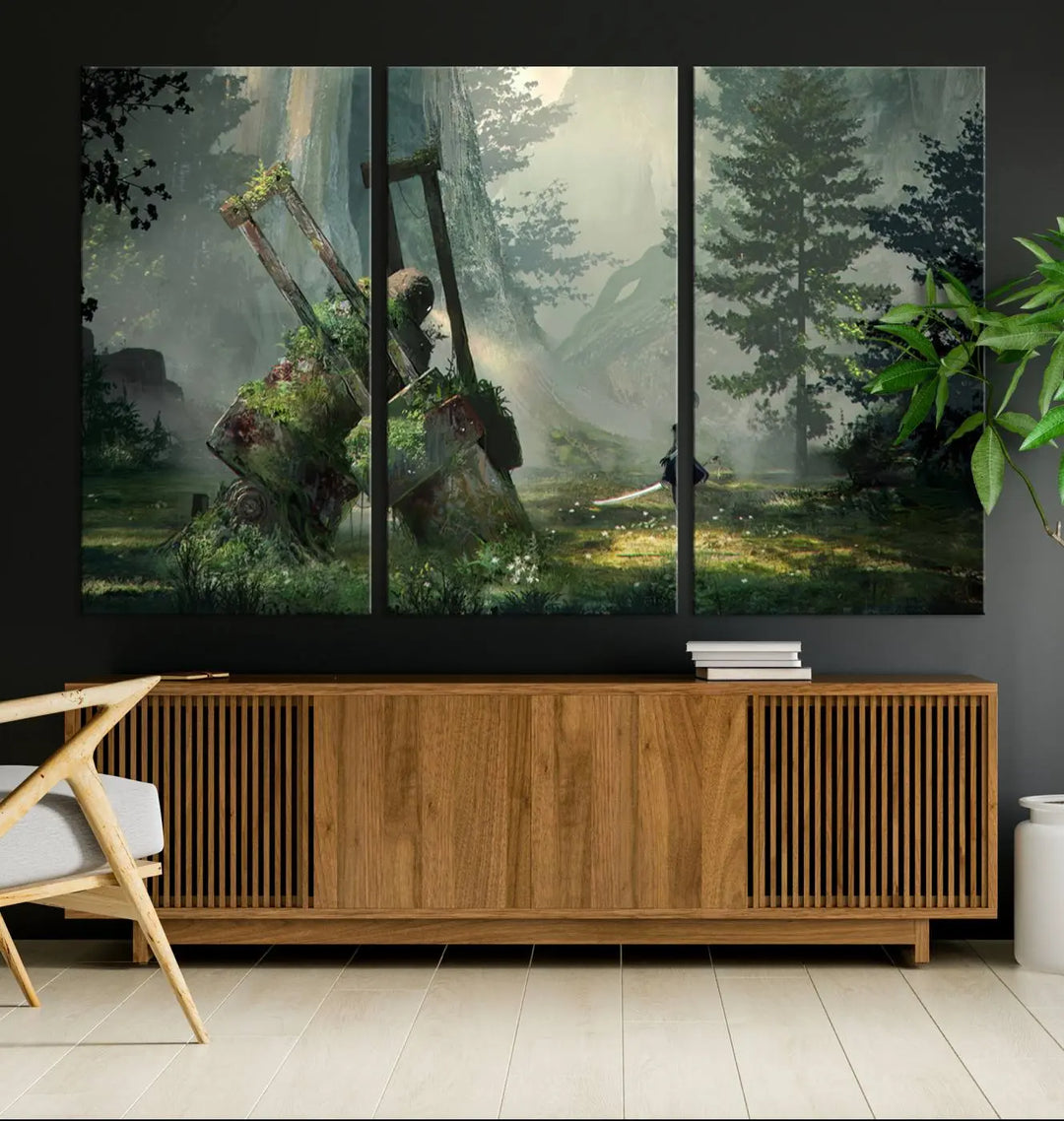 A living room showcases a framed multi-panel canvas print wall art titled "NieR Automata Video Game Wall Art Canvas Print." This museum-quality piece is ready to hang and depicts a misty forest with an old machine.