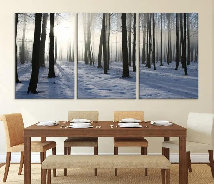 The "Night Forest Wall Art" canvas print showcases a snowy forest bathed in soft sunlight. It is printed on museum-quality canvas with a UV-protective coating.