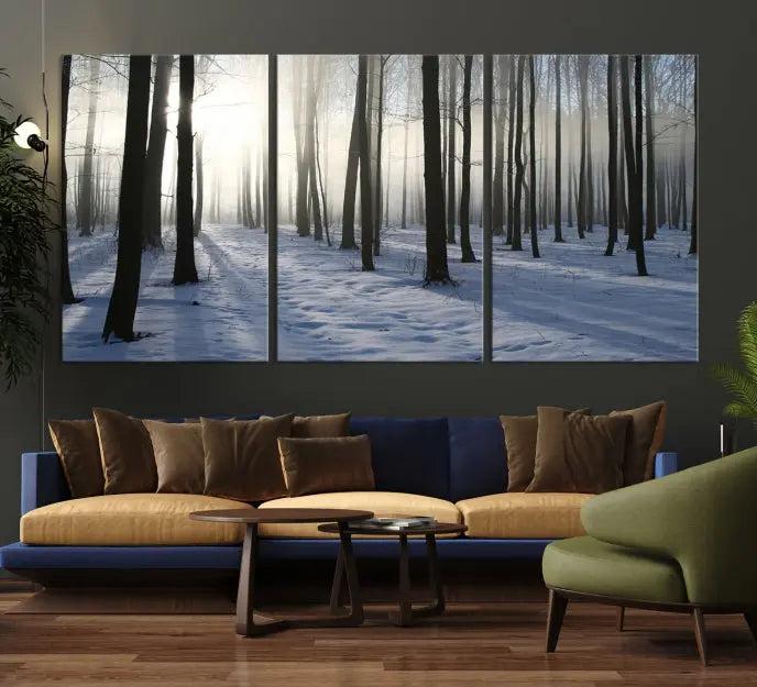 The "Night Forest Wall Art" canvas print showcases a snowy forest bathed in soft sunlight. It is printed on museum-quality canvas with a UV-protective coating.