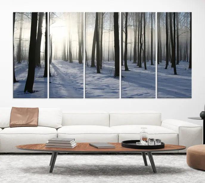 The "Night Forest Wall Art" canvas print showcases a snowy forest bathed in soft sunlight. It is printed on museum-quality canvas with a UV-protective coating.