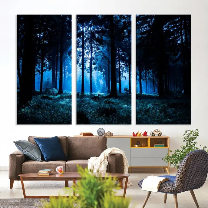 A modern living room showcasing the "Night in Dark Forest" wall art—forest-themed multi-panel canvases with museum-quality details.