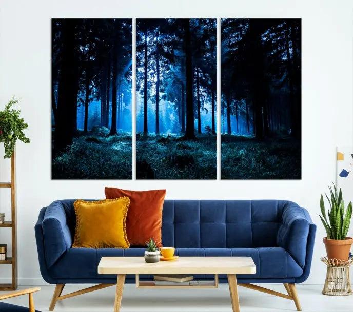 A modern living room showcasing the "Night in Dark Forest" wall art—forest-themed multi-panel canvases with museum-quality details.