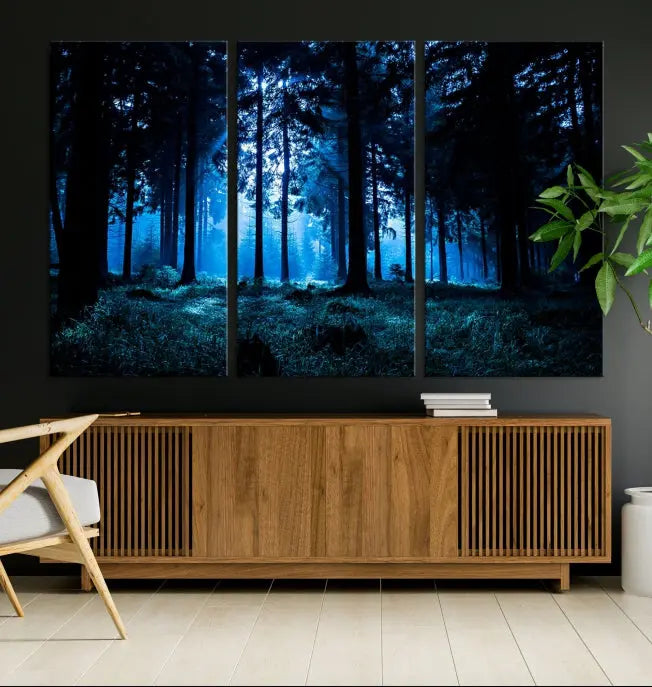 A modern living room showcasing the "Night in Dark Forest" wall art—forest-themed multi-panel canvases with museum-quality details.