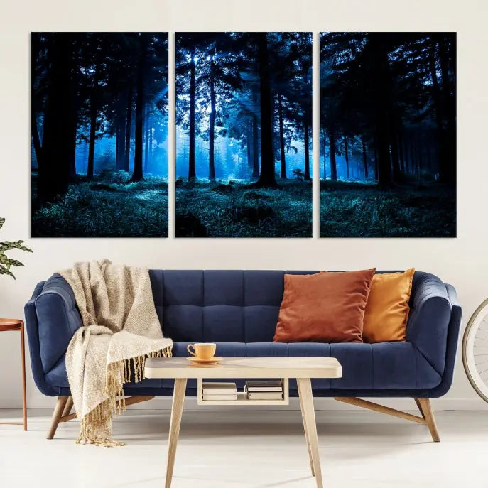 A modern living room showcasing the "Night in Dark Forest" wall art—forest-themed multi-panel canvases with museum-quality details.