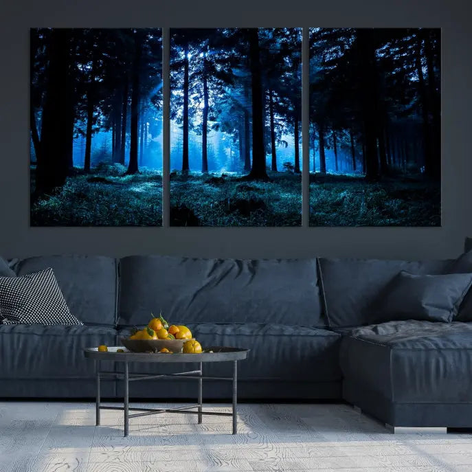 A modern living room showcasing the "Night in Dark Forest" wall art—forest-themed multi-panel canvases with museum-quality details.