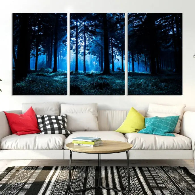 A modern living room showcasing the "Night in Dark Forest" wall art—forest-themed multi-panel canvases with museum-quality details.