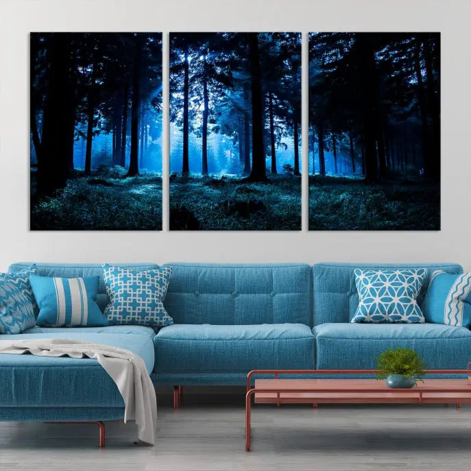 A modern living room showcasing the "Night in Dark Forest" wall art—forest-themed multi-panel canvases with museum-quality details.