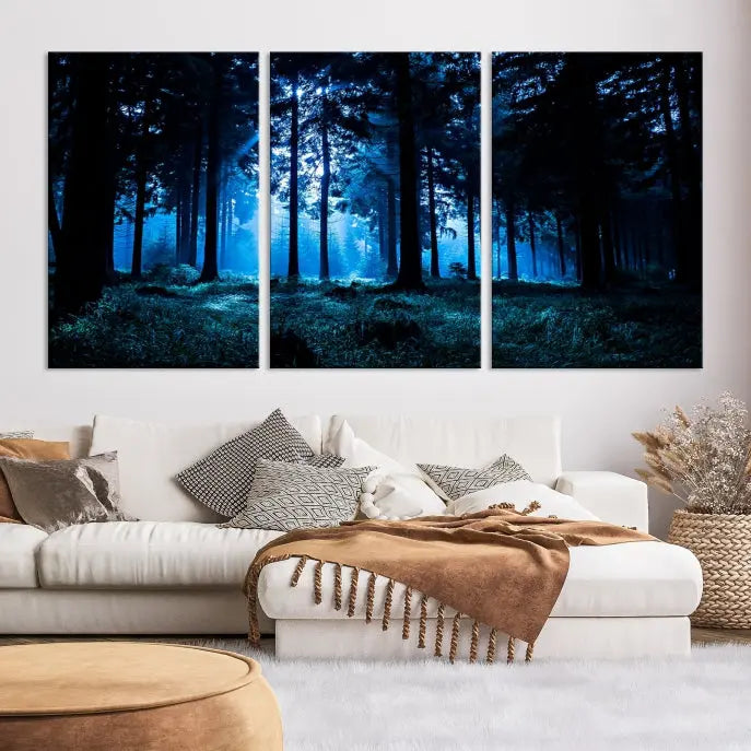 A modern living room showcasing the "Night in Dark Forest" wall art—forest-themed multi-panel canvases with museum-quality details.