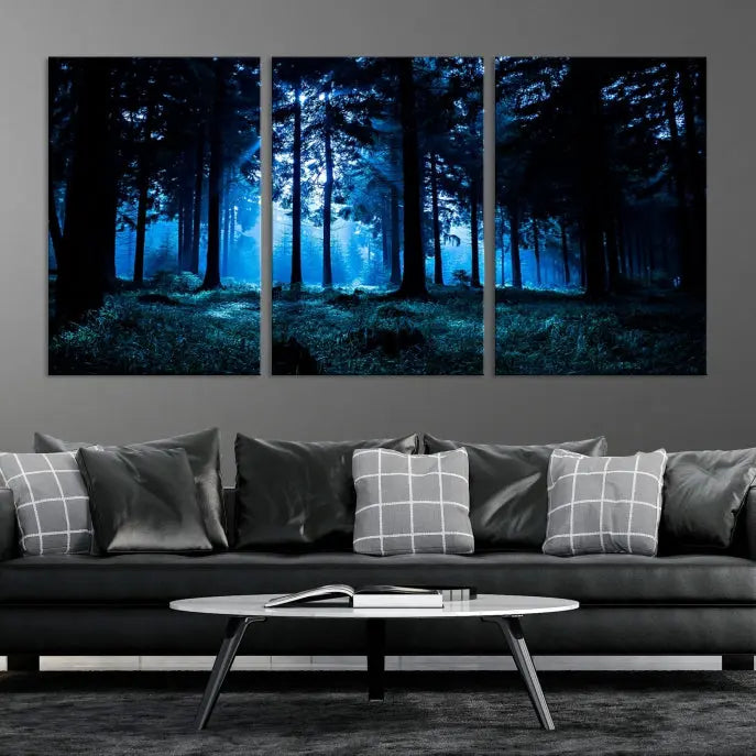 A modern living room showcasing the "Night in Dark Forest" wall art—forest-themed multi-panel canvases with museum-quality details.