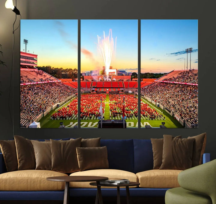 Experience the vibrant atmosphere of a packed crowd, an impressive field display, and dazzling fireworks at sunset in this artwork titled "North Carolina State University Wolfpack Football Team Print - Raleigh Carter-Finley Stadium." This scene is beautifully captured on a canvas print.