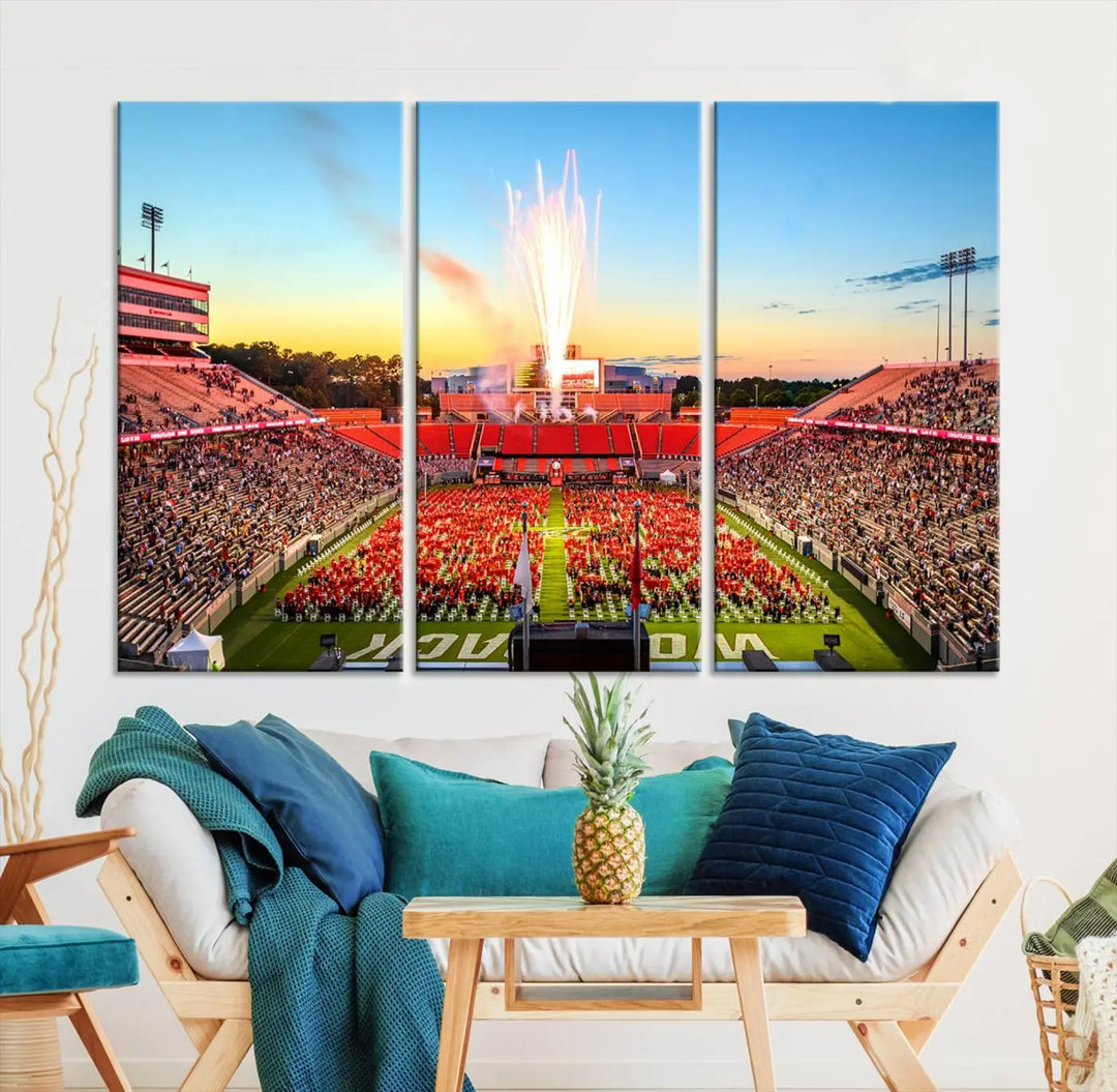 Experience the vibrant atmosphere of a packed crowd, an impressive field display, and dazzling fireworks at sunset in this artwork titled "North Carolina State University Wolfpack Football Team Print - Raleigh Carter-Finley Stadium." This scene is beautifully captured on a canvas print.