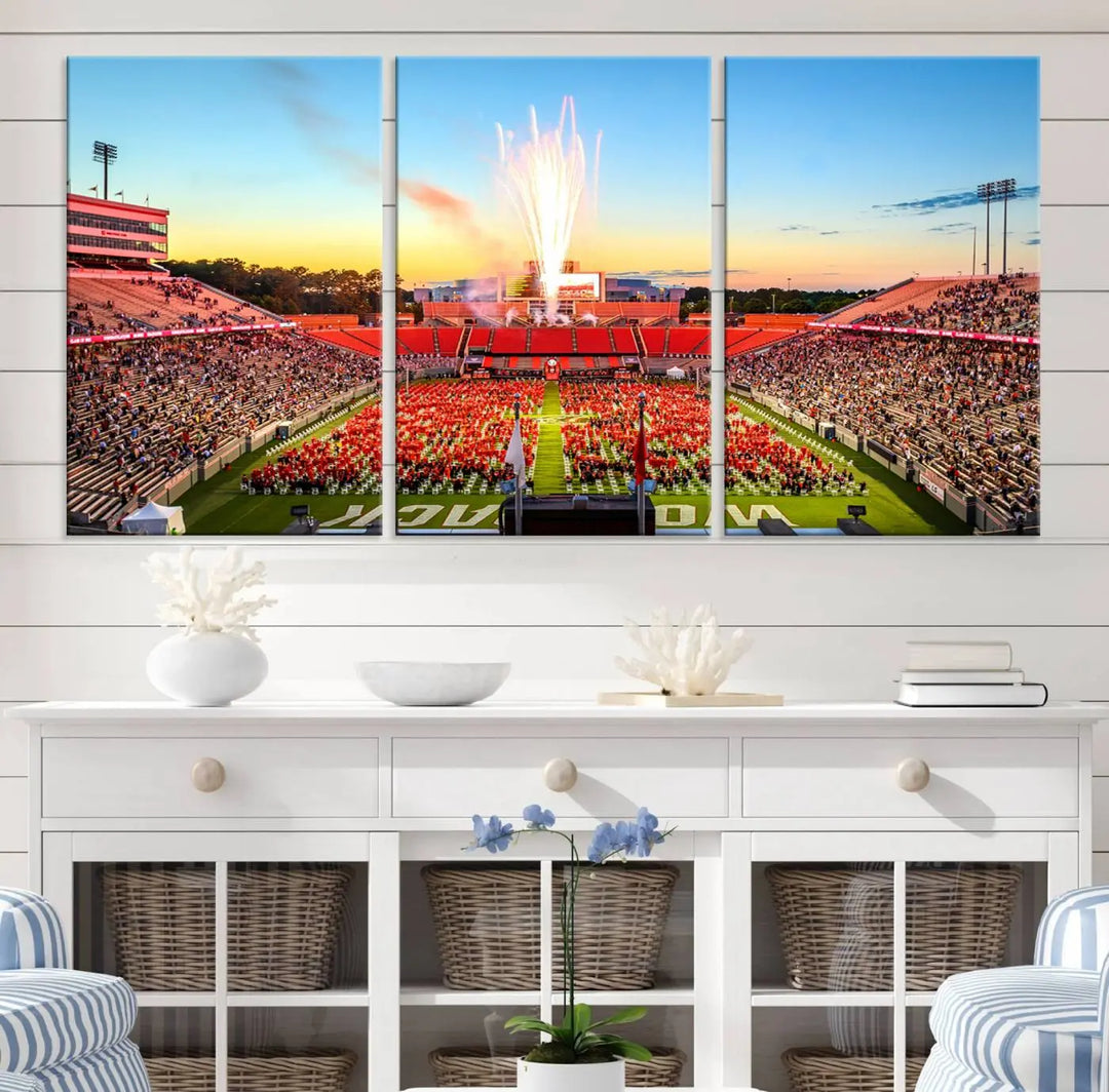 Experience the vibrant atmosphere of a packed crowd, an impressive field display, and dazzling fireworks at sunset in this artwork titled "North Carolina State University Wolfpack Football Team Print - Raleigh Carter-Finley Stadium." This scene is beautifully captured on a canvas print.