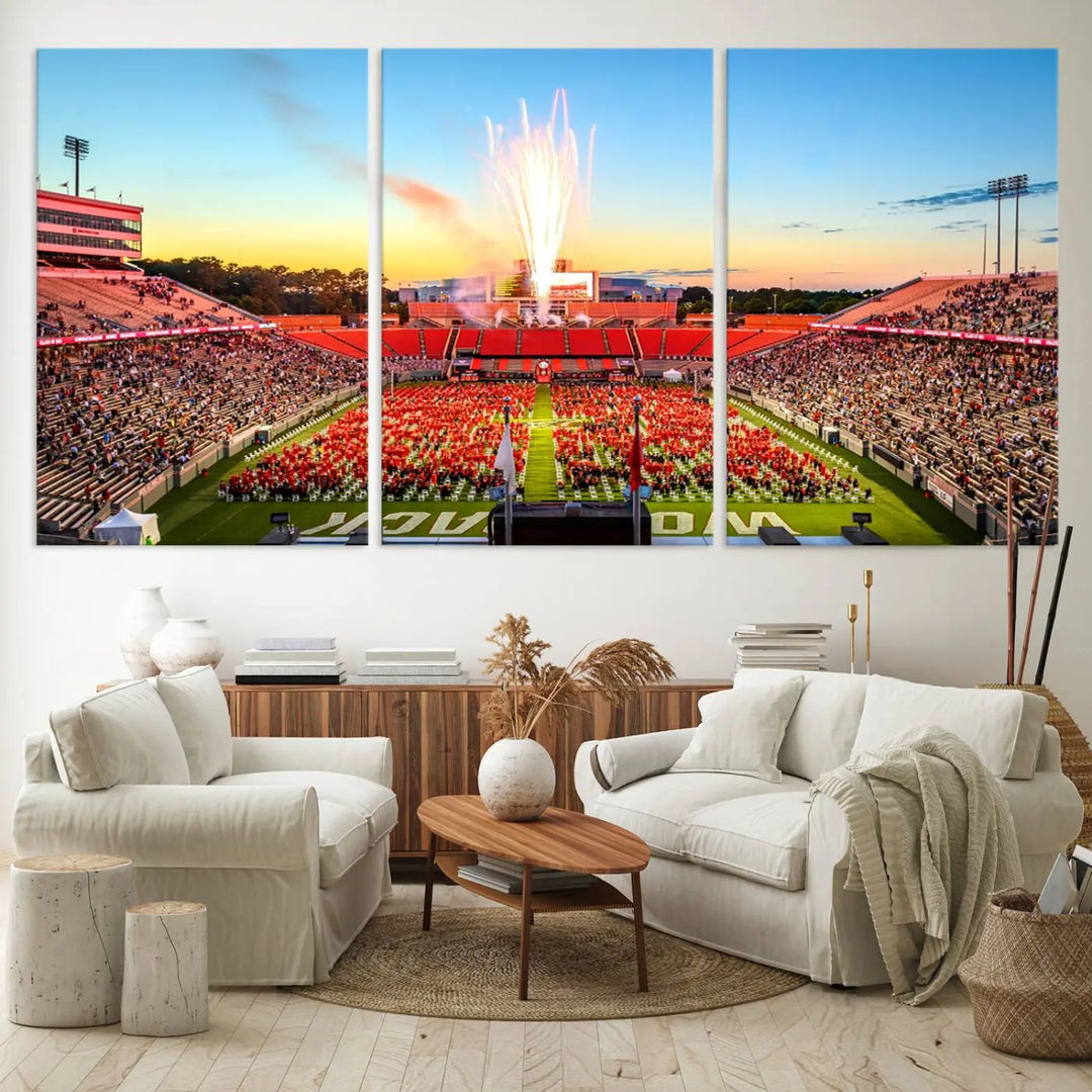 Experience the vibrant atmosphere of a packed crowd, an impressive field display, and dazzling fireworks at sunset in this artwork titled "North Carolina State University Wolfpack Football Team Print - Raleigh Carter-Finley Stadium." This scene is beautifully captured on a canvas print.