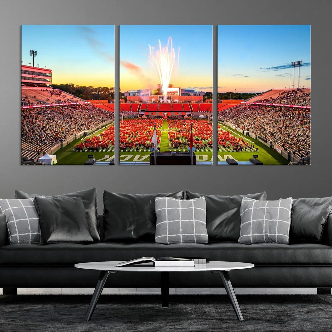 Experience the vibrant atmosphere of a packed crowd, an impressive field display, and dazzling fireworks at sunset in this artwork titled "North Carolina State University Wolfpack Football Team Print - Raleigh Carter-Finley Stadium." This scene is beautifully captured on a canvas print.