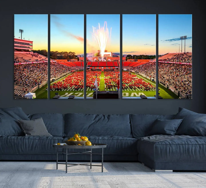 Experience the vibrant atmosphere of a packed crowd, an impressive field display, and dazzling fireworks at sunset in this artwork titled "North Carolina State University Wolfpack Football Team Print - Raleigh Carter-Finley Stadium." This scene is beautifully captured on a canvas print.