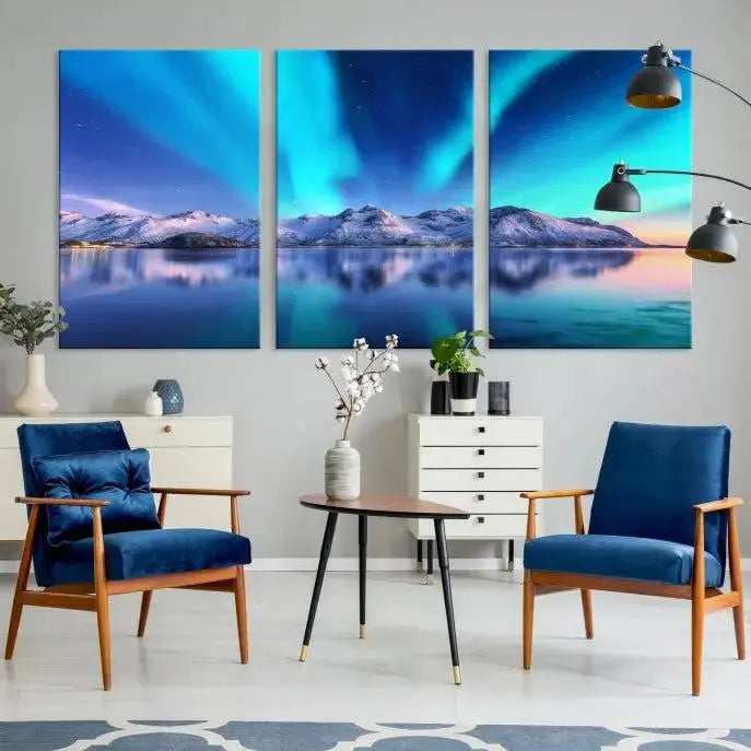 The room features the "Northern Lights above Mountain Wall Art Canvas Print," showcasing a triptych of the aurora borealis over snowy mountains and a lake. Professionally crafted frames on museum-quality canvases are highlighted in the modern decor.