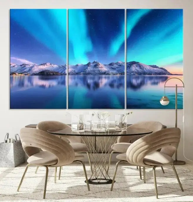 The room features the "Northern Lights above Mountain Wall Art Canvas Print," showcasing a triptych of the aurora borealis over snowy mountains and a lake. Professionally crafted frames on museum-quality canvases are highlighted in the modern decor.