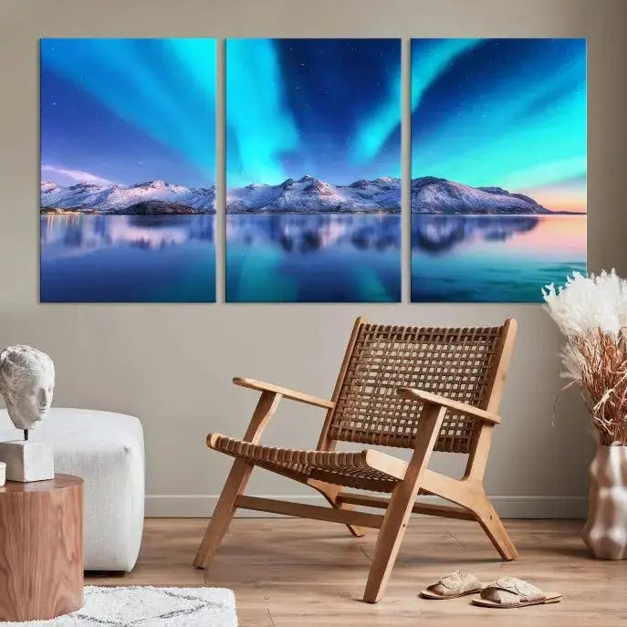 The room features the "Northern Lights above Mountain Wall Art Canvas Print," showcasing a triptych of the aurora borealis over snowy mountains and a lake. Professionally crafted frames on museum-quality canvases are highlighted in the modern decor.